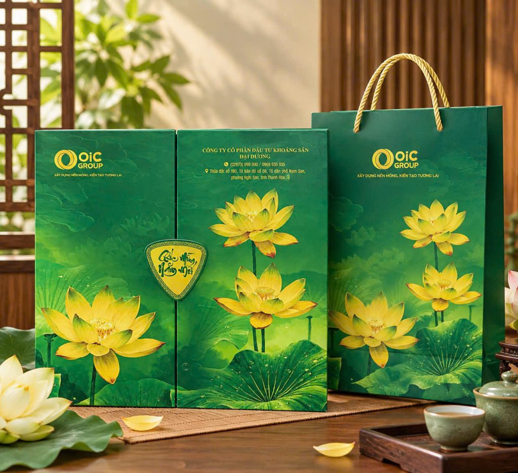 Hộp quà tết doanh nghiệp màu xanh lá họa tiết hoa sen in logo, kèm túi giấy